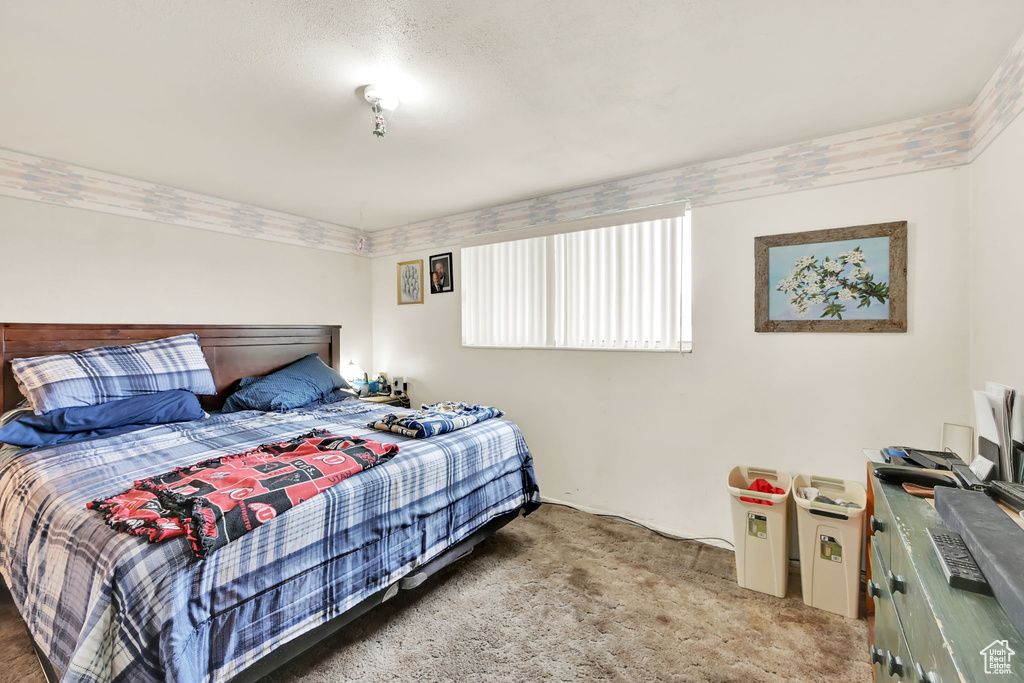 Bedroom with carpet