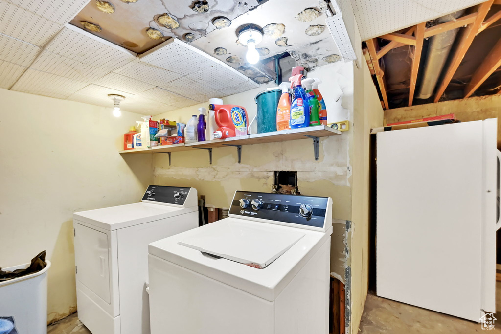 Washroom featuring separate washer and dryer