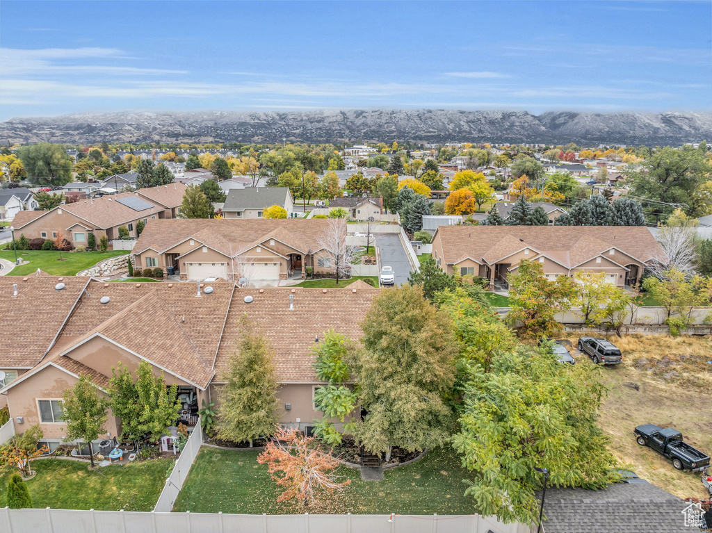 Birds eye view of property with a mountain view