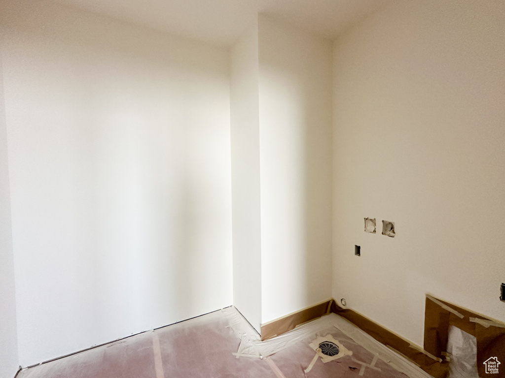 Washroom featuring light colored carpet