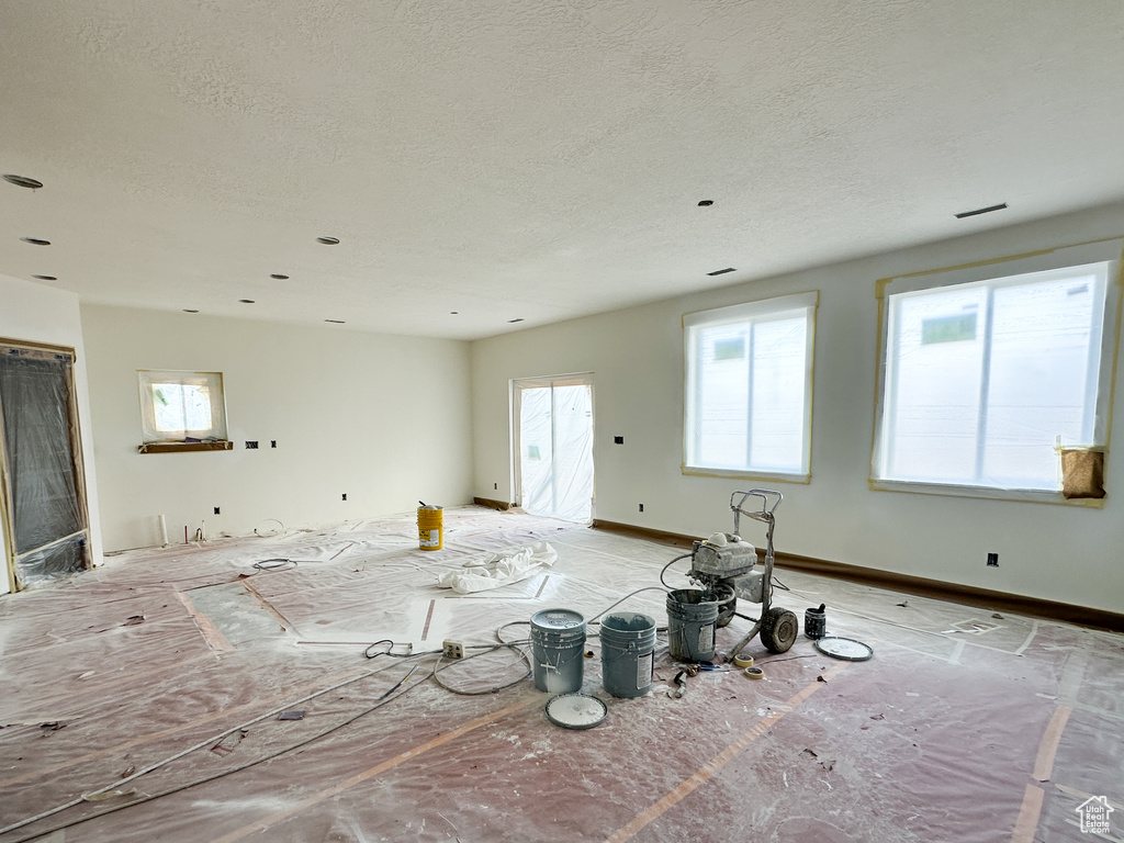 Spare room featuring a textured ceiling