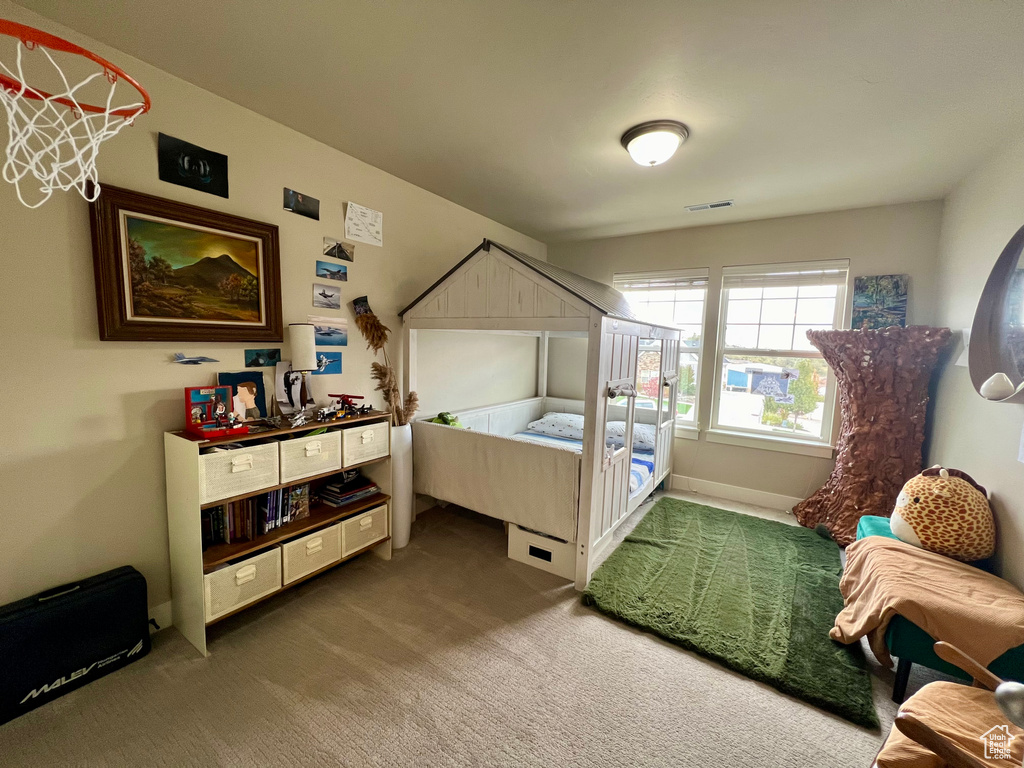 View of carpeted bedroom