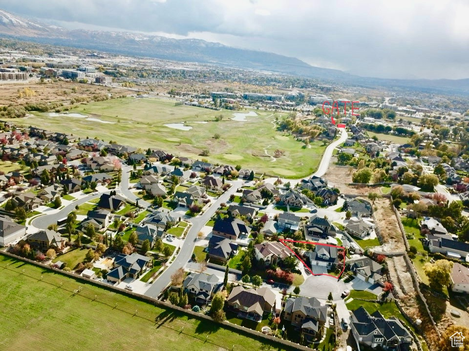 Birds eye view of property featuring a mountain view