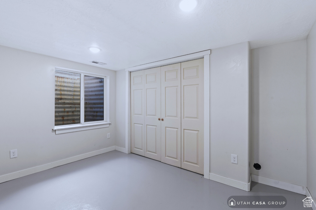 Unfurnished bedroom featuring a closet