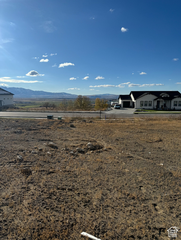 Property view of mountains featuring a rural view