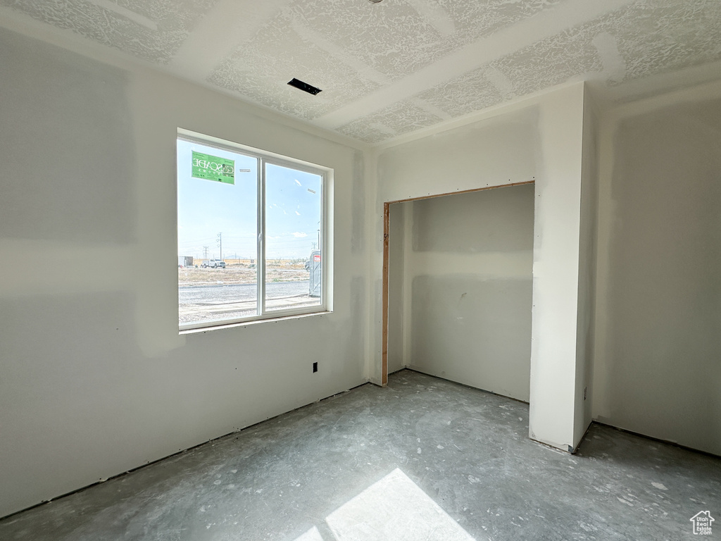 Unfurnished bedroom featuring a closet