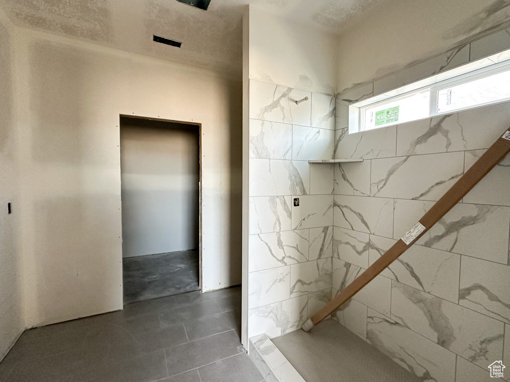 Bathroom featuring walk in shower