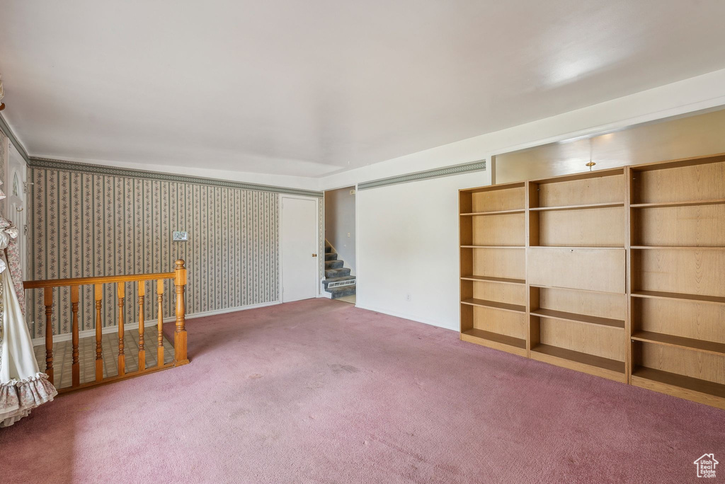 Unfurnished room featuring carpet flooring