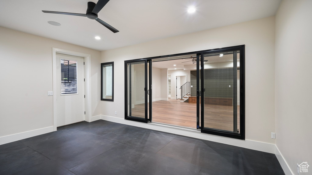 Unfurnished room featuring ceiling fan