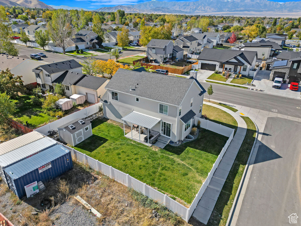 Birds eye view of property featuring a mountain view