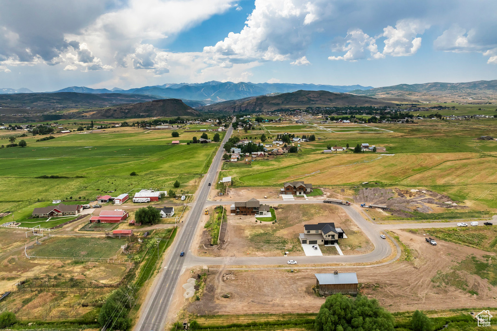 Drone / aerial view with a mountain view and a rural view