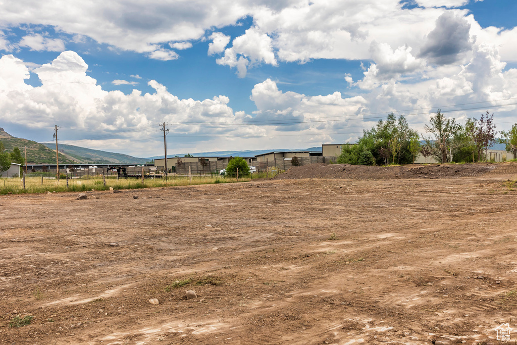 View of yard featuring a mountain view