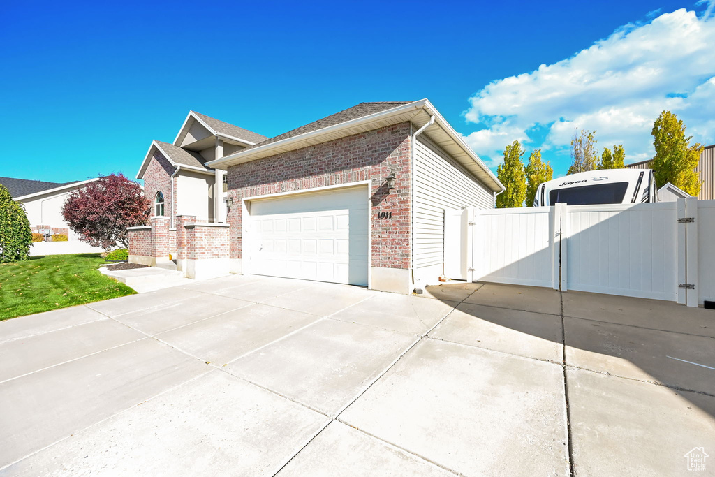 View of home's exterior featuring a garage