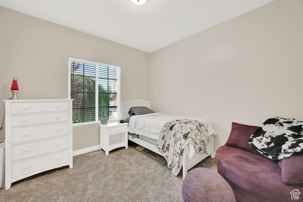 View of carpeted bedroom