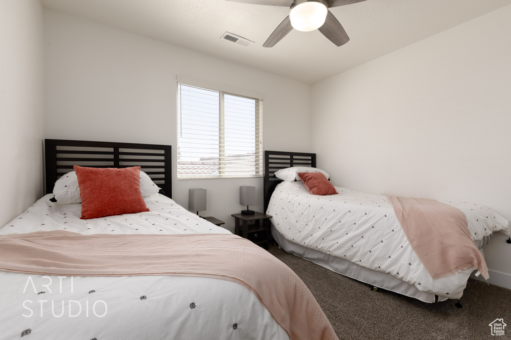 Bedroom featuring carpet flooring and ceiling fan