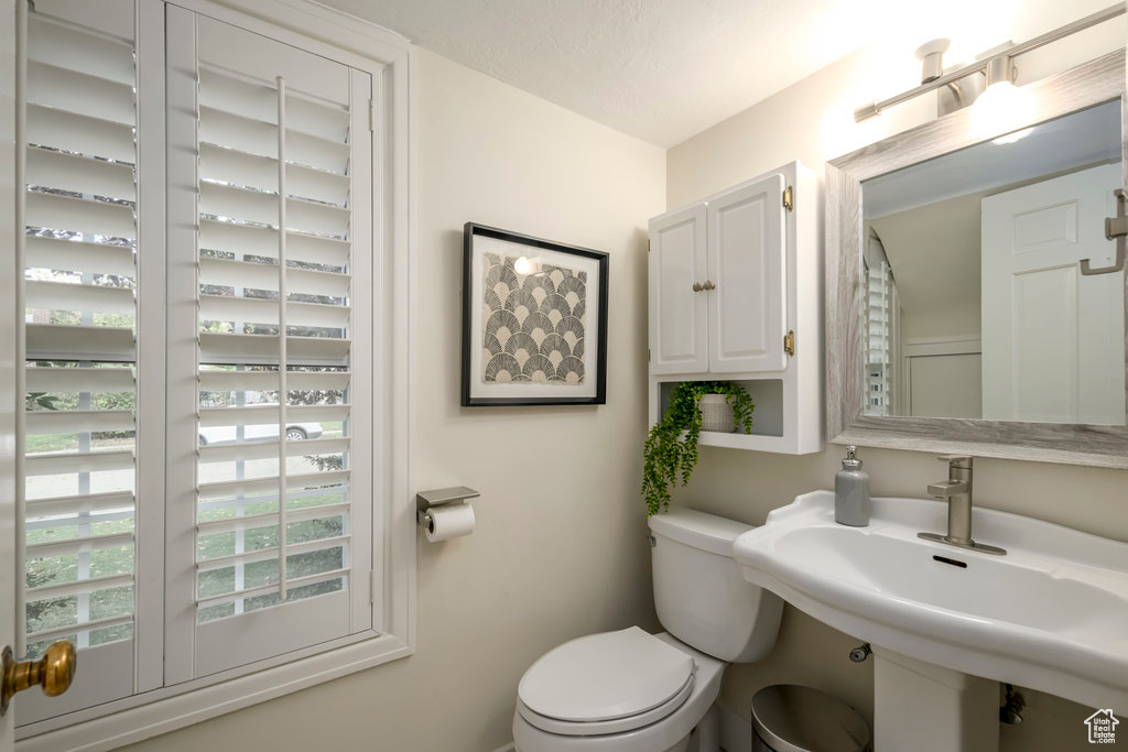 Bathroom featuring toilet and sink