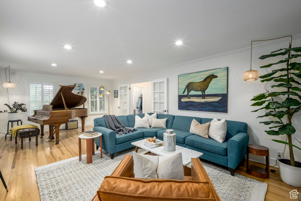 Living room with light wood-type flooring