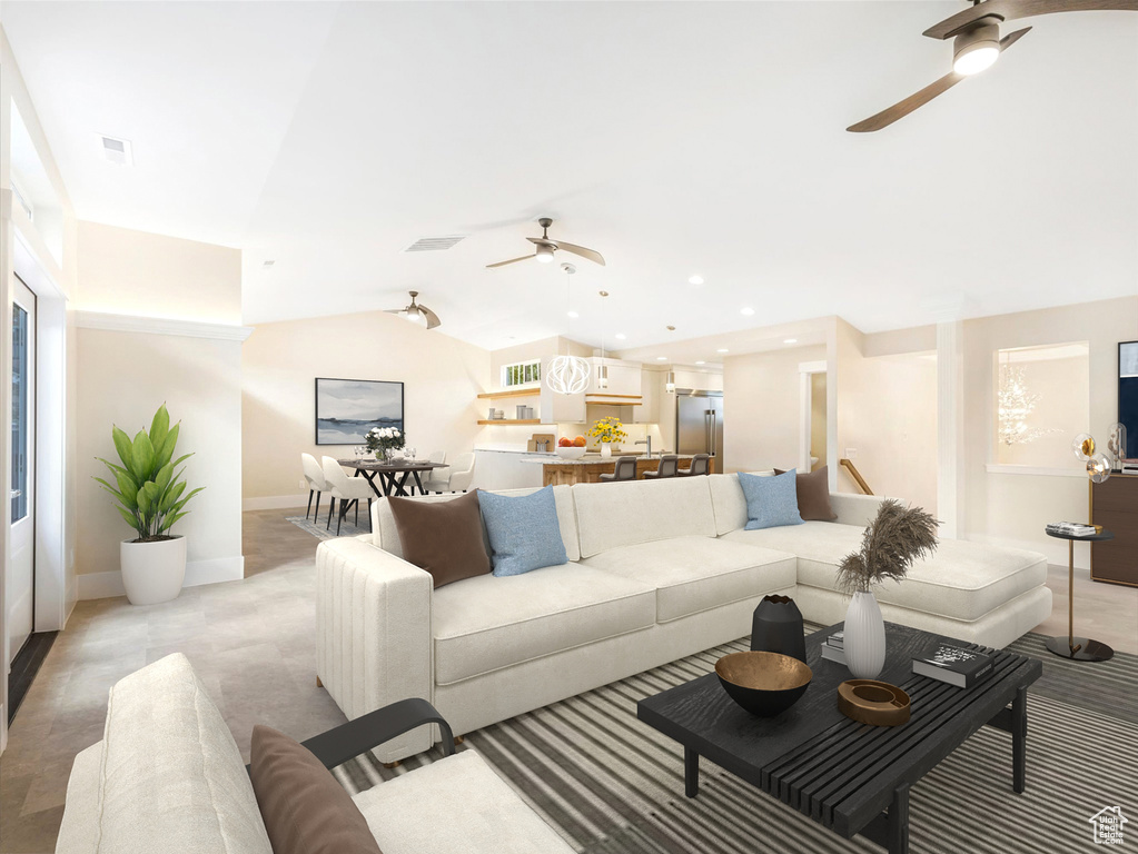 Living room with lofted ceiling, a healthy amount of sunlight, visible vents, and recessed lighting