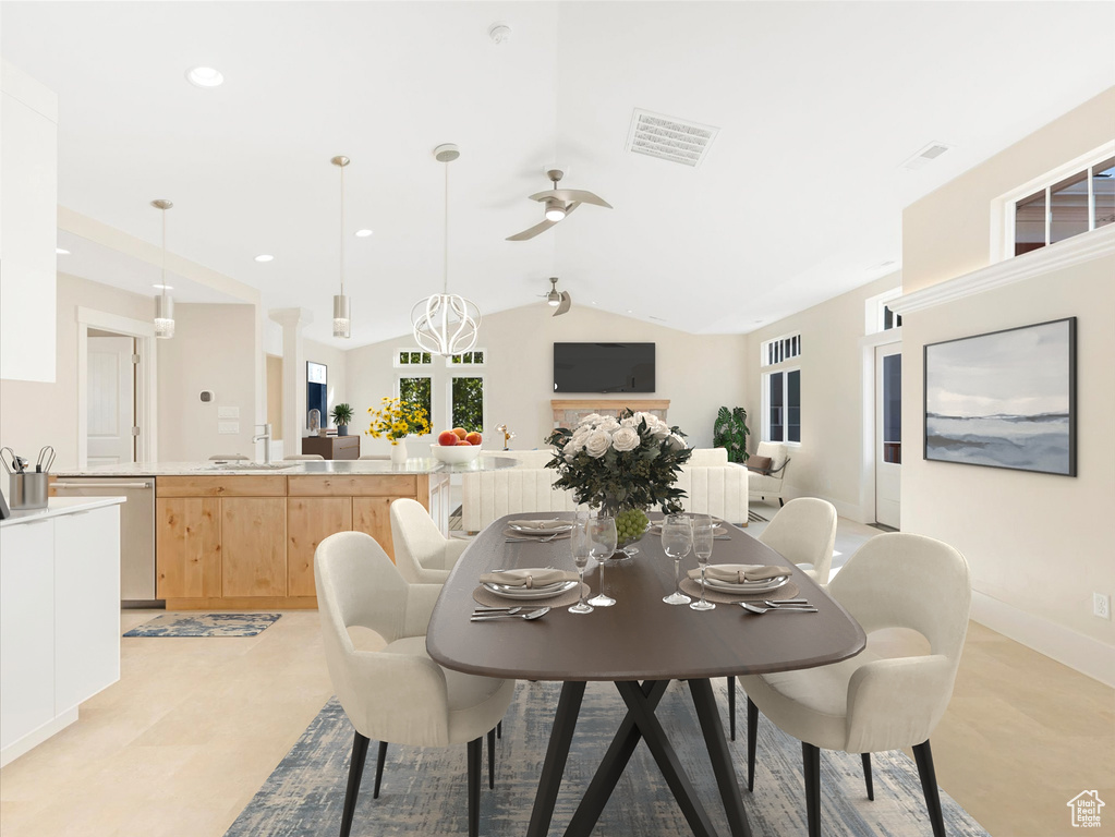 Dining area with visible vents, baseboards, lofted ceiling, ceiling fan, and recessed lighting