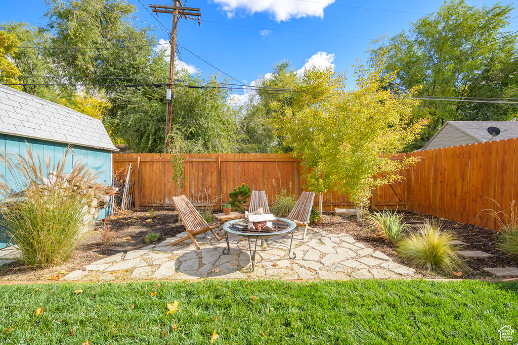 View of patio / terrace featuring a fire pit