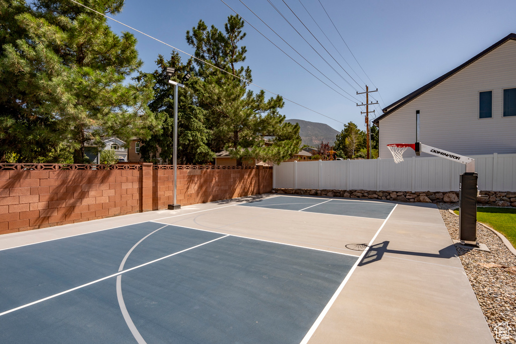 View of sport court featuring a mountain view