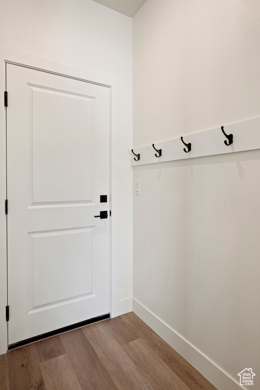 Mudroom with hardwood / wood-style floors