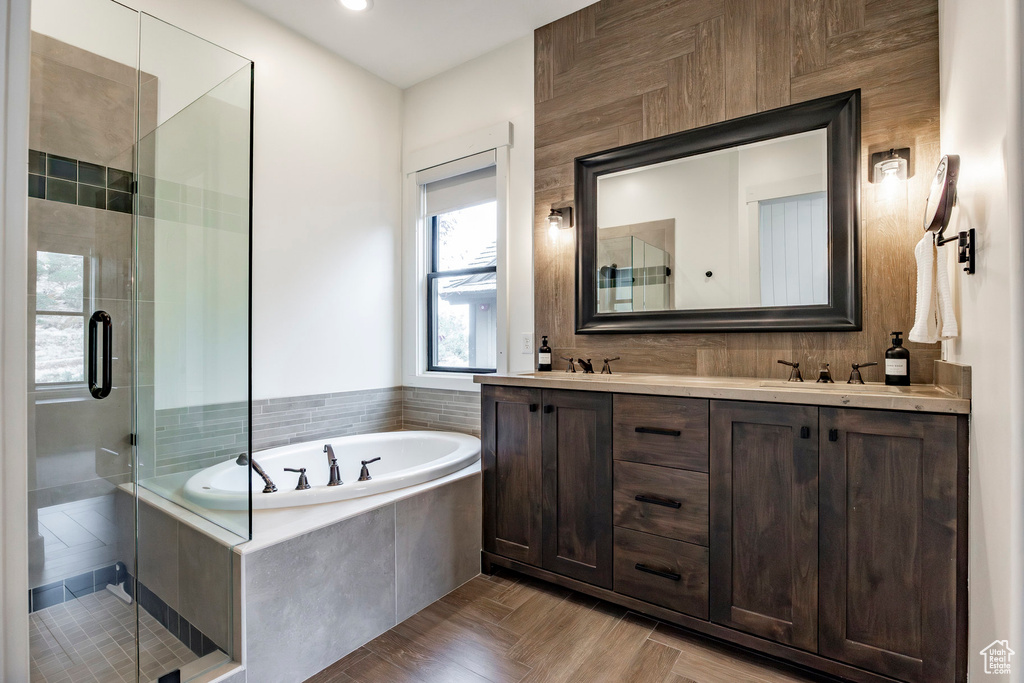 Bathroom with vanity and independent shower and bath