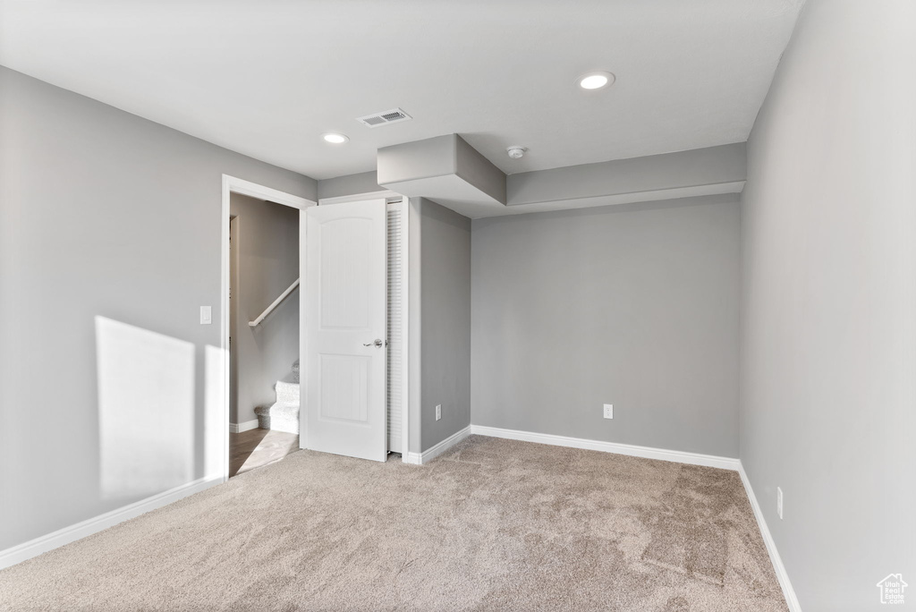 Interior space with light colored carpet