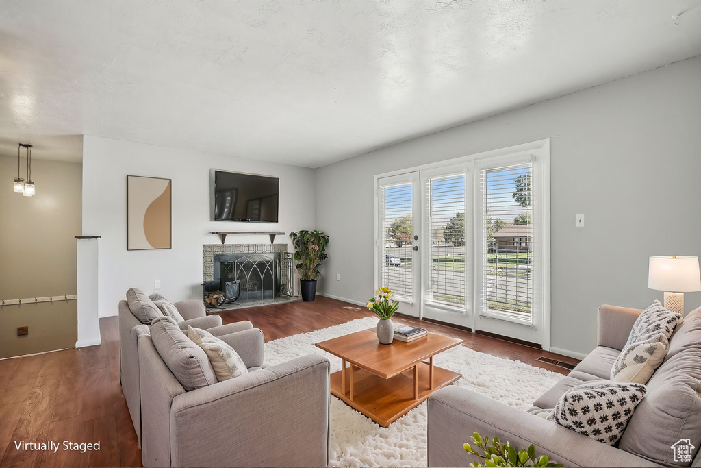 Living room featuring hardwood / wood-style flooring