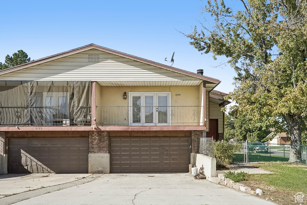 View of front of home with a garage