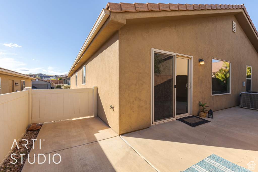 Rear view of property featuring a patio