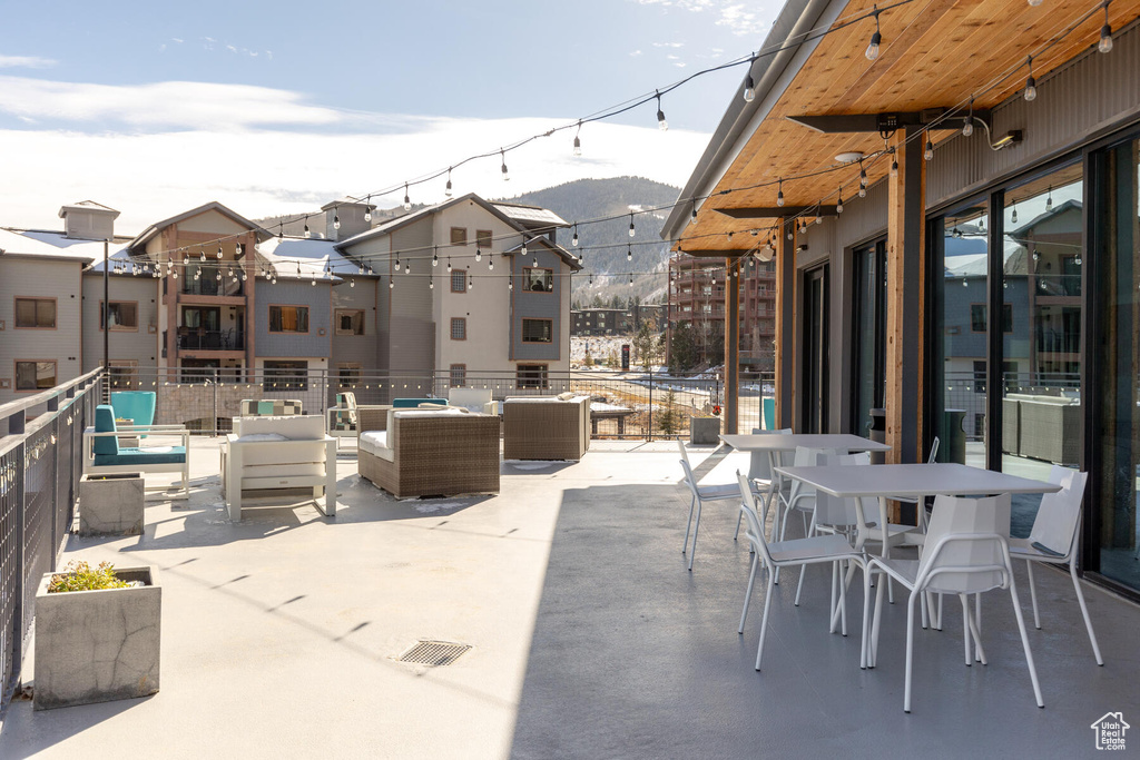 View of patio / terrace with outdoor lounge area and a mountain view