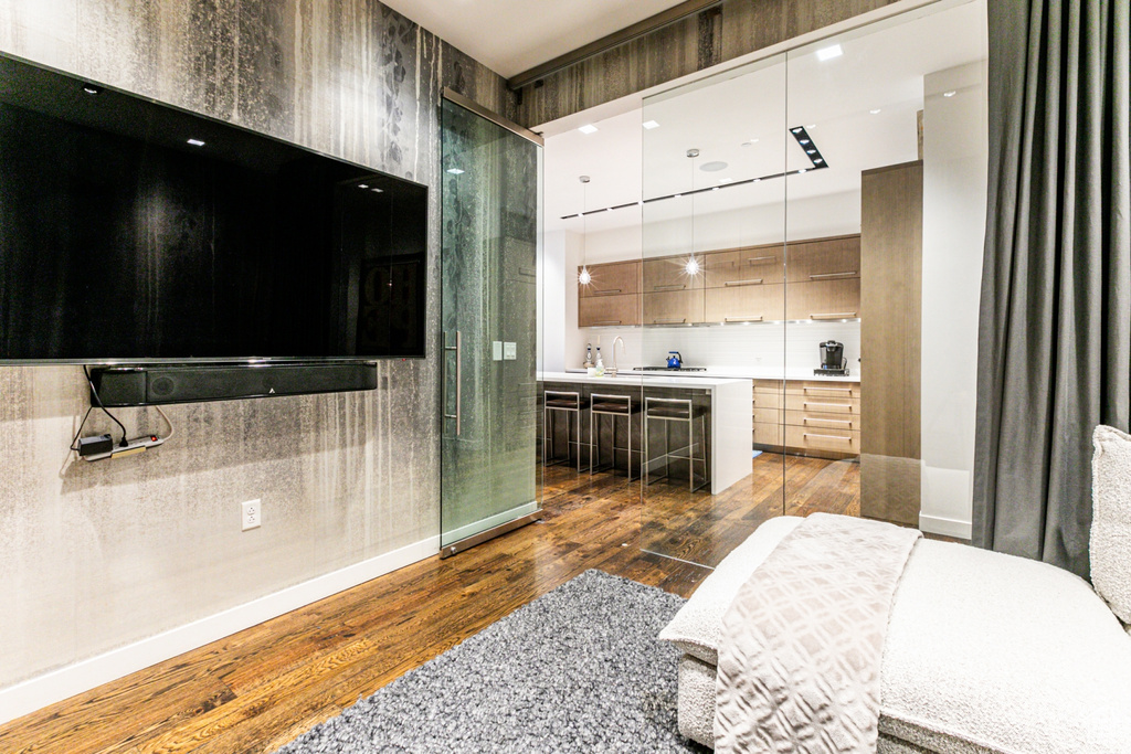 Bathroom with vanity and wood-type flooring