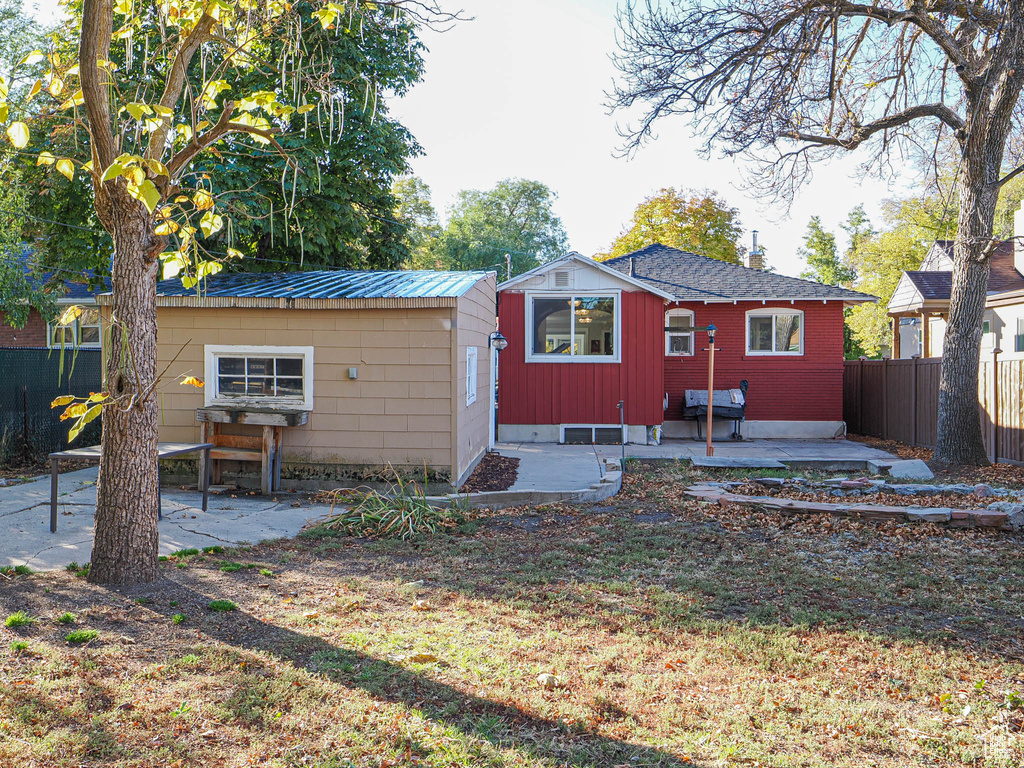 Rear view of house with a patio area