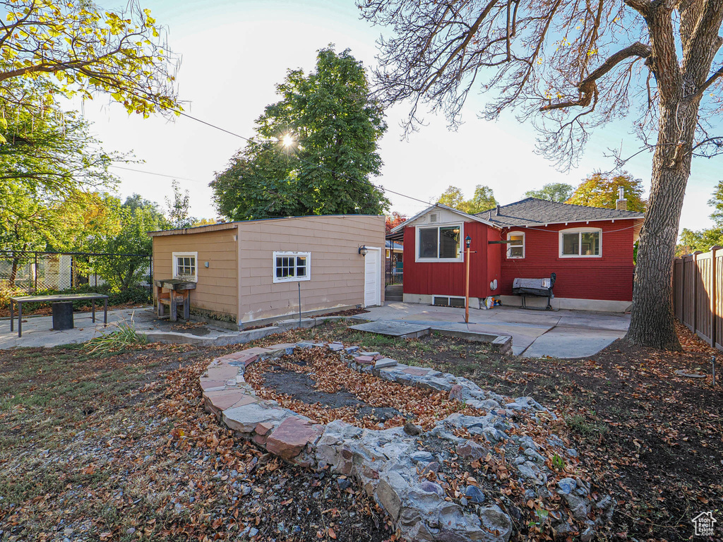 Rear view of house with a patio