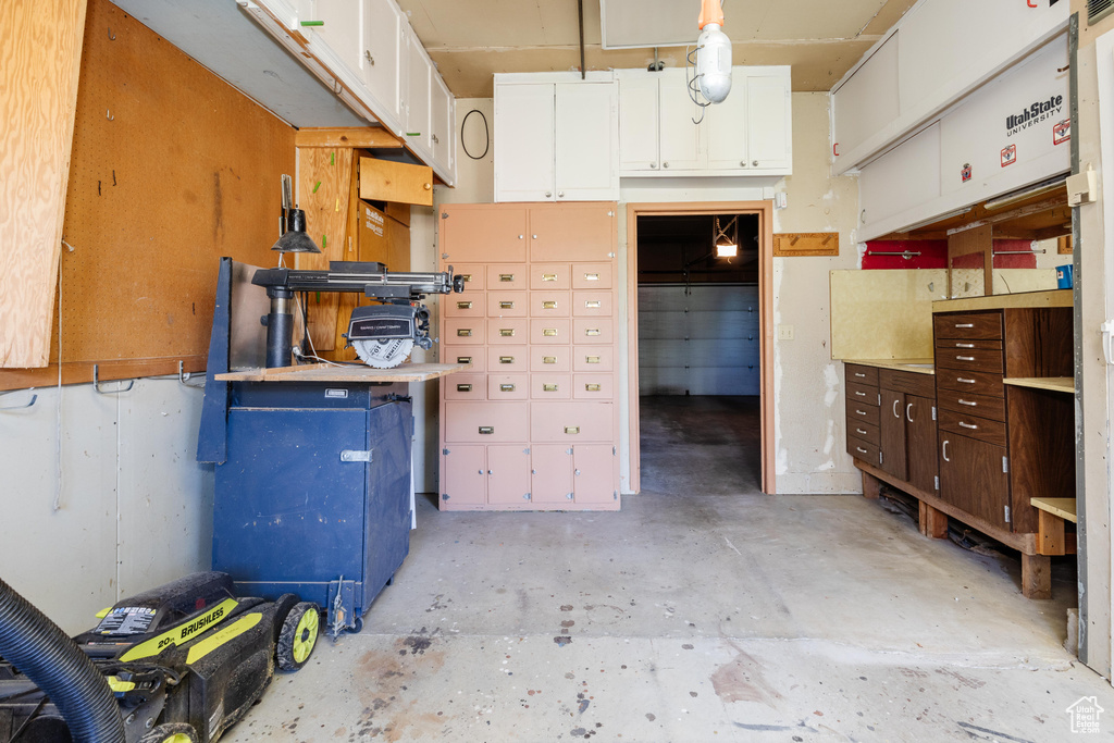 Interior space featuring white cabinetry