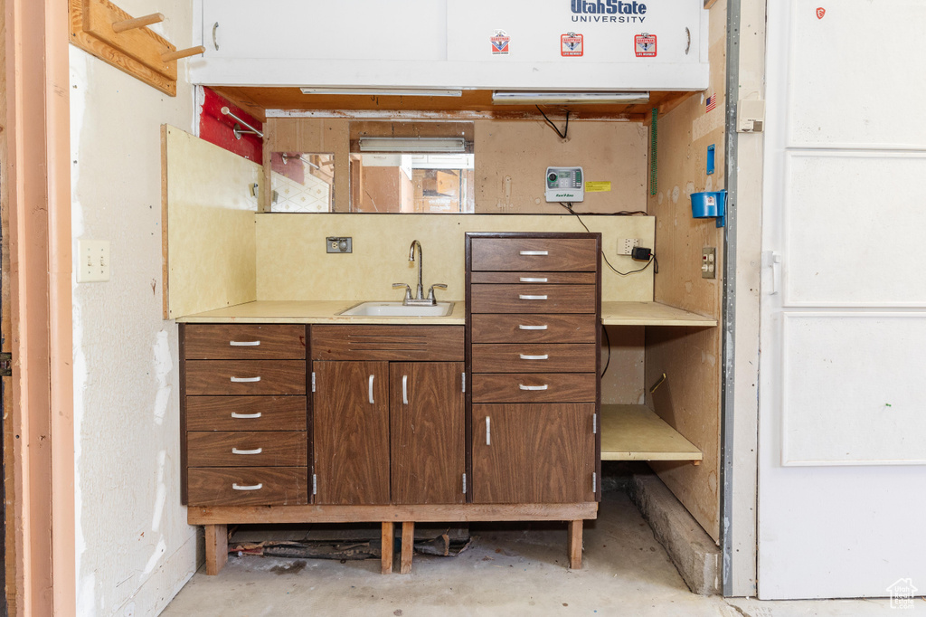 Bathroom with vanity and concrete floors