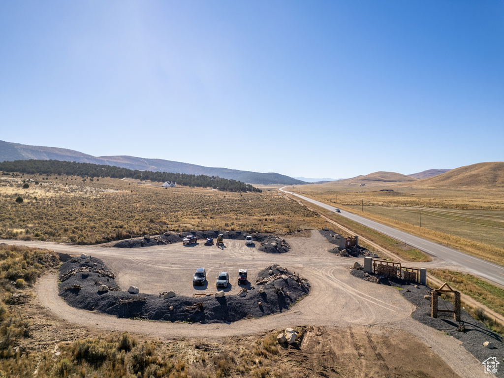 Drone / aerial view with a mountain view and a rural view