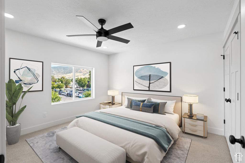 Bedroom featuring light carpet, recessed lighting, baseboards, a closet, and a ceiling fan