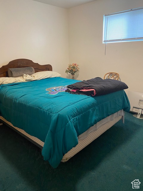 Bedroom featuring carpet floors