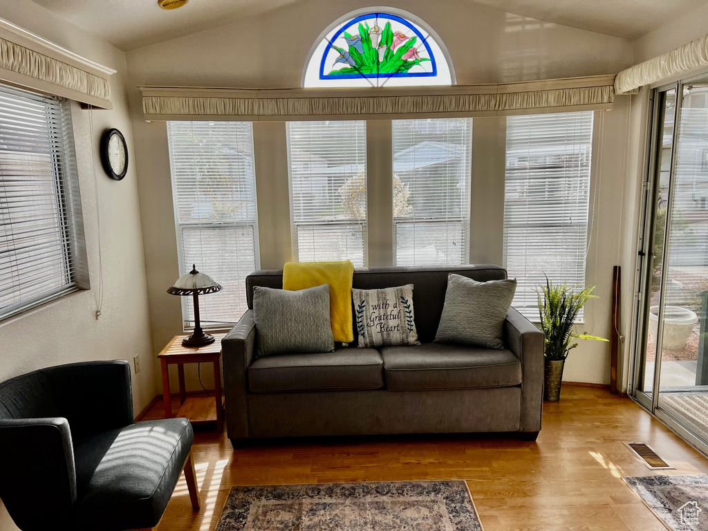 Sunroom featuring visible vents