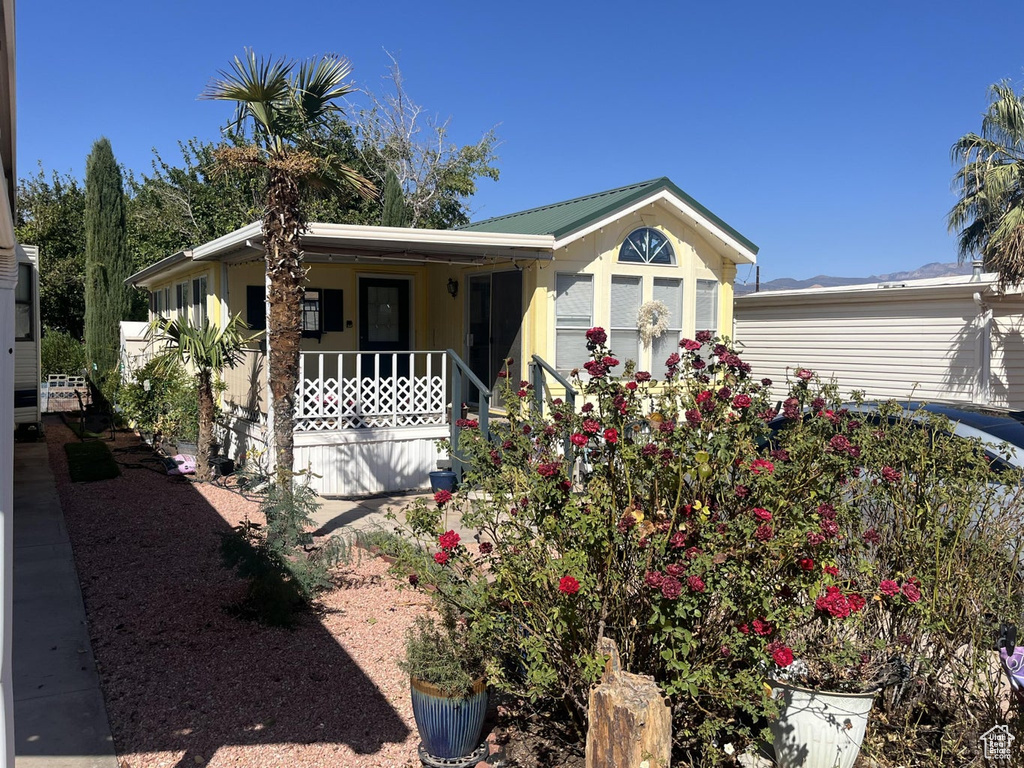 View of front of property featuring covered porch
