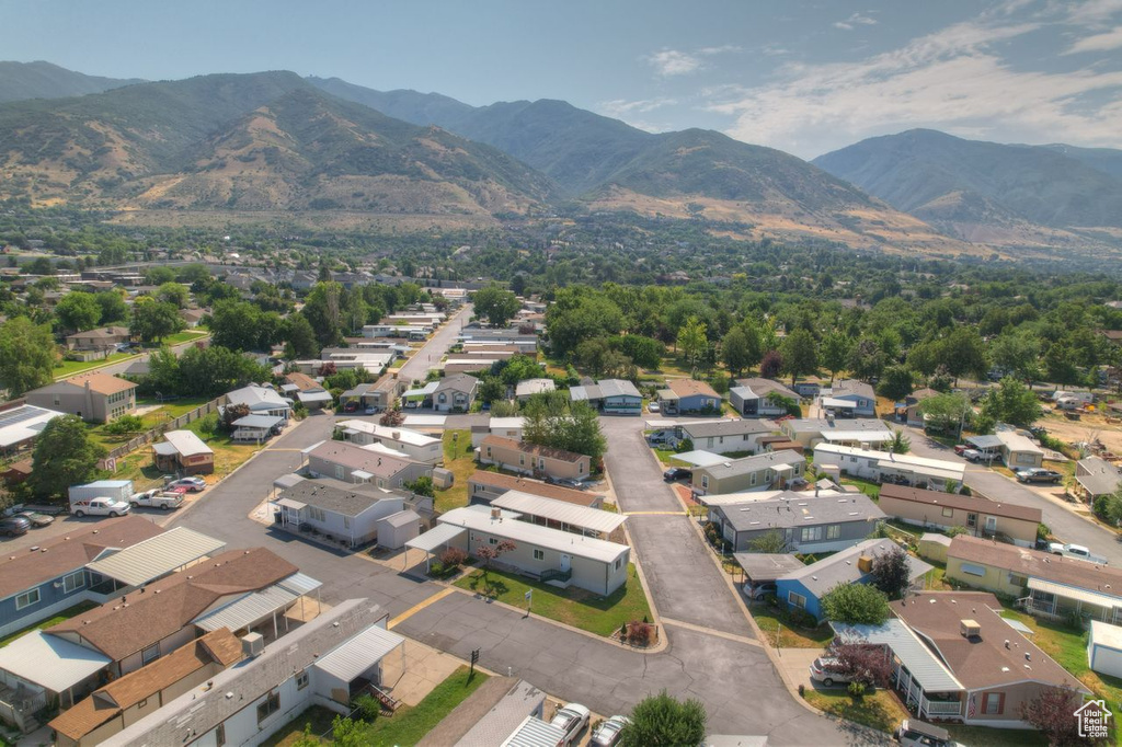 Birds eye view of property featuring a mountain view