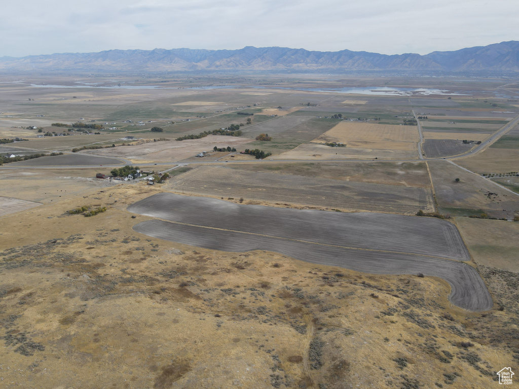 Aerial view featuring a rural view and a mountain view