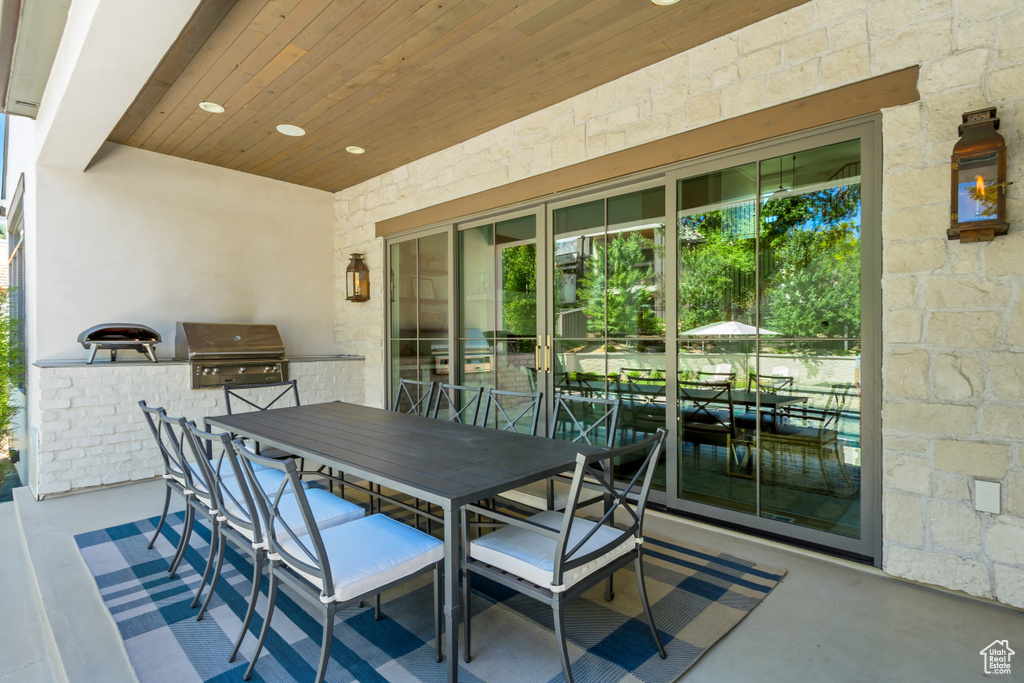 View of patio / terrace featuring exterior kitchen and area for grilling