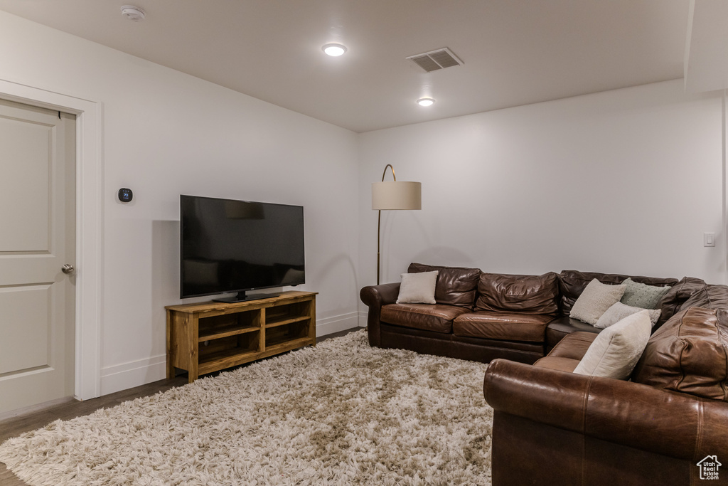 Living room featuring hardwood / wood-style flooring