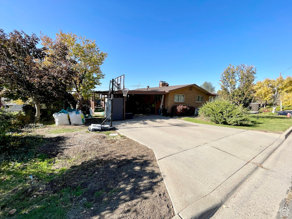 View of front of home featuring a carport