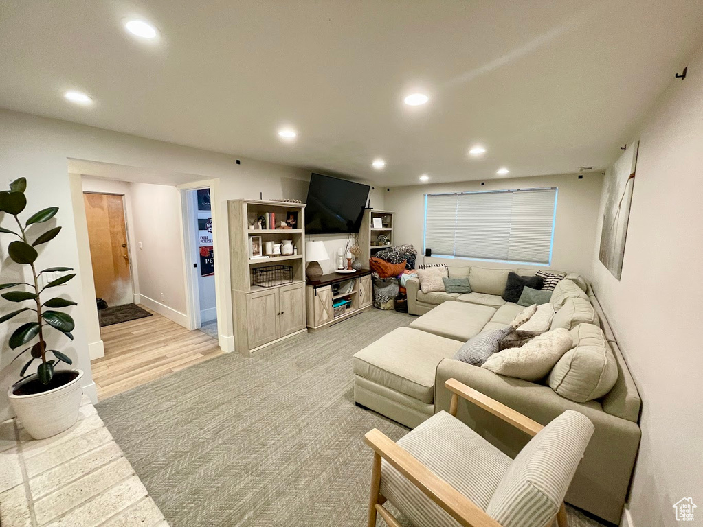 Living room with light wood-type flooring