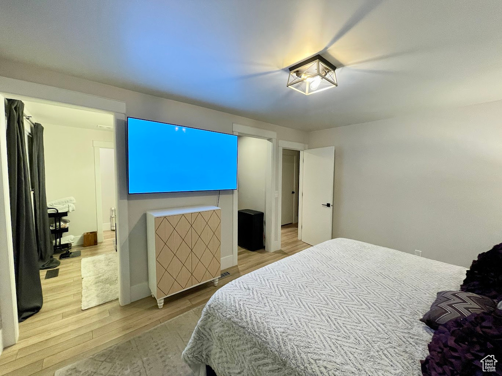 Bedroom featuring light hardwood / wood-style flooring