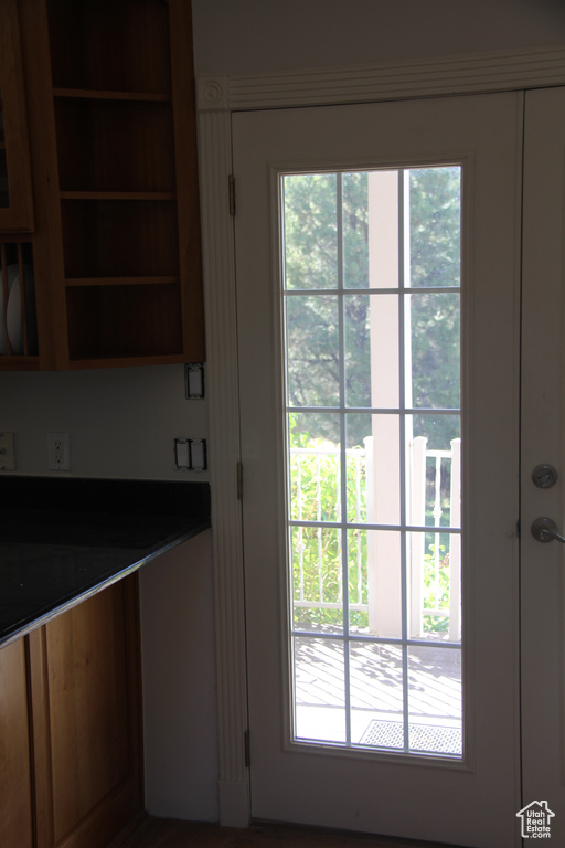 Doorway to outside with plenty of natural light